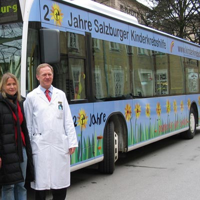Werbeagentur K-Design: Grafikdesign Buswerbung 20 Jahre Salzburger Kinderkrebshilfe